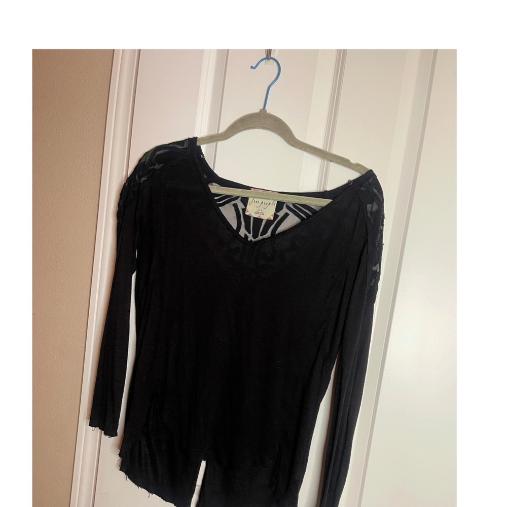 Distressed free people black top with lace detail on the back